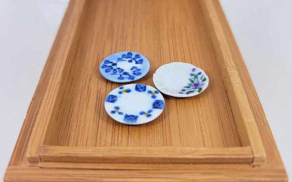 Blue Floral, Blue/Yellow design, and Purple Floral