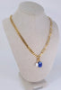 Pearl Clasp Pendant (108454) layered with Lapis Pendant (108450) on Half & Half Necklace (108552) - Each sold separately
