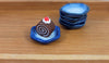 Mini Hexagon Plates pictured with a cake roll from our Miniature Sweet Shop (108623)