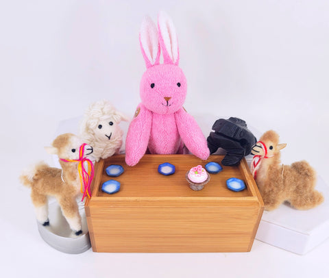 Mini Hexagon Plates pictured with one of our Cake Shop Minis (108621), our Small Stuffed Alpaca Vicunas (105573, sitting and standing versions), one of our Small Felt Sheep (108430), a pink Bunny with Buttons (108068), and one of our Black Wood Frogs (102346)